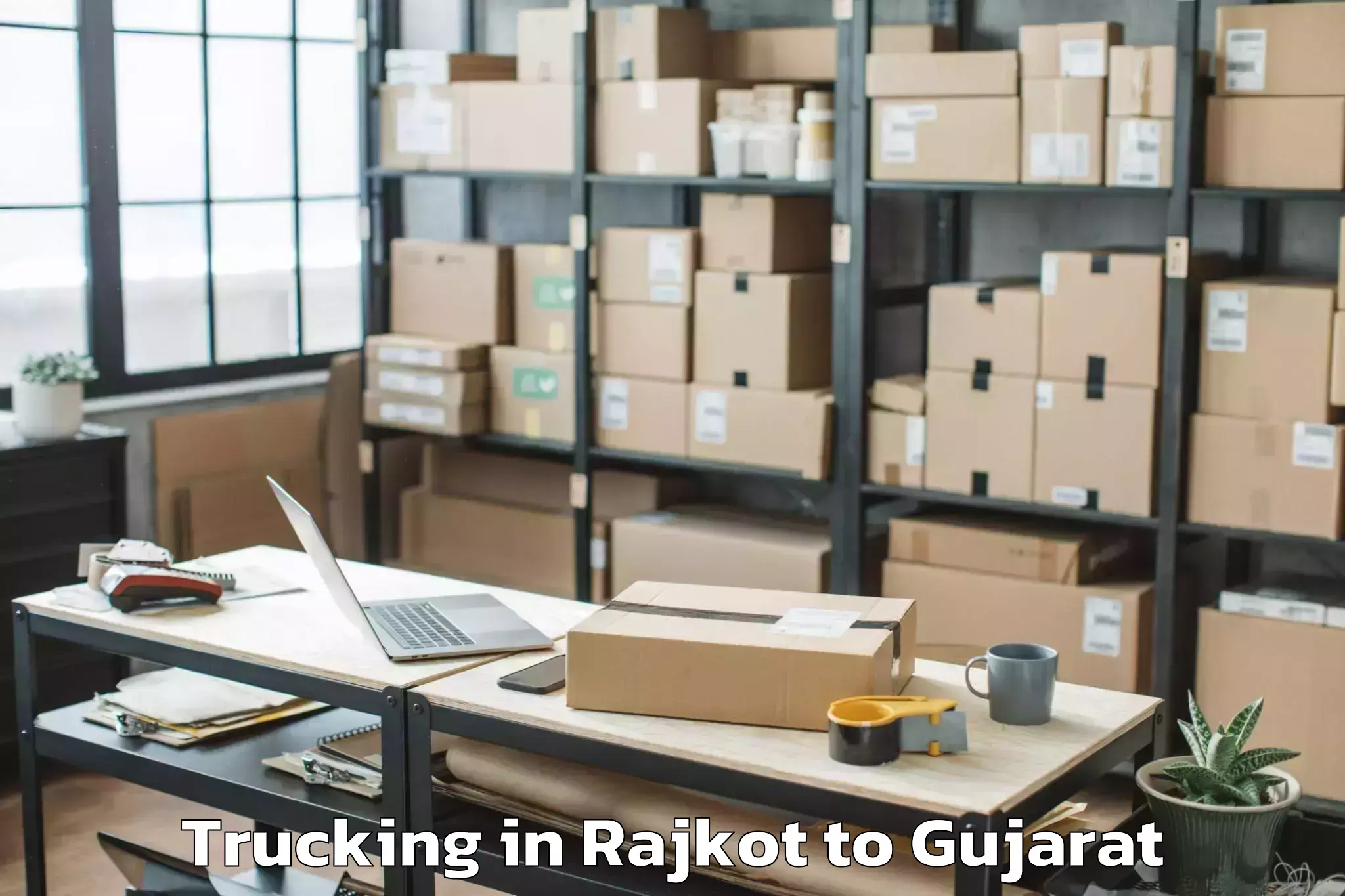 Easy Rajkot to Dungra Trucking Booking